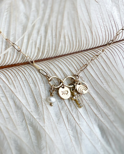 Symbolic Gold Charm Necklace